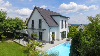 Luxuriöses Architektenhaus mit Einliegerwohnung, Pool und uneinsehbarem Grundstück am Roten Hügel!
