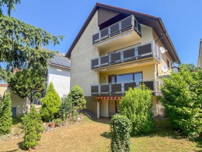 Großzügiges Mehrfamilienhaus mit 3 Wohneinheiten, Garten und 3 Garagenplätzen