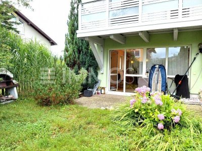 Sonnige Gartenharmonie  Stilvolles Zuhause mit privater Grünfläche