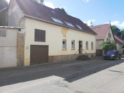 Wohnhaus mit Werkstatt, "Steinbruch" und Baugrundstück