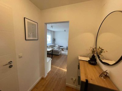 Gepflegte 2-Zimmer-Wohnung mit Parkett und Gartenanteil