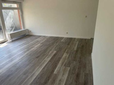 Moderne 1-Raum-Souterrain-Wohnung mit Terrasse und EBK in Stockelsdorf