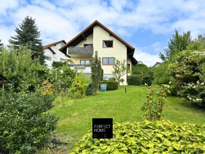 Viel Platz, viele Möglichkeiten: Zweifamilienhaus mit Traumgarten & zusätzlicher Einliegerwohnung