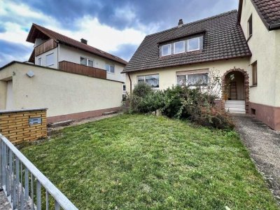 Doppelhaushälfte mit Garten – Potenzial für einen zusätzlichen Anbau!