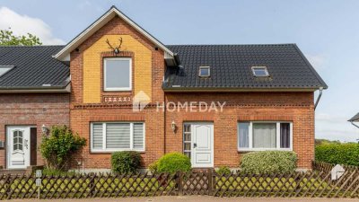 Einfamilienhaus mit zwei Wohneinheiten, Wintergarten, Terrasse und Blick ins Grüne in Hoisdorf