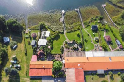 Direkt am See: Gepflegtes 4-Zi.-Zuhause mit einzigartigem Grundstück, Bootssteg und Einliegerwhg.