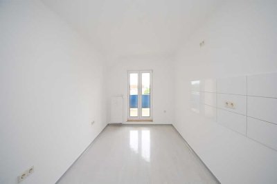 Schöne DG-Wohnung mit Balkon - in ruhiger und grüner Umgebung