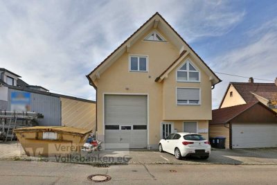Voll vermietetes Wohn- und Geschäftshaus mit Werkstatt, Garage, Lagerfläche.