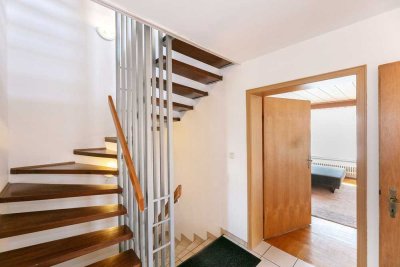 Reizende Doppelhaushälfte mit Garage und schönem Garten in gepflegter Lage