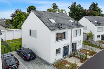 Ihr neues Zuhause: Modernes Mietshaus mit Garten und Garage