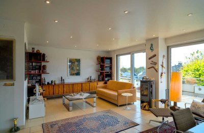 Exklusives, helles Penthouse mit Kaminofen, großer Dachterrasse und zwei Tiefgaragenstellplätzen