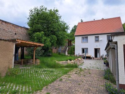 Einfamiliehaus mit Garten in Hanglage
