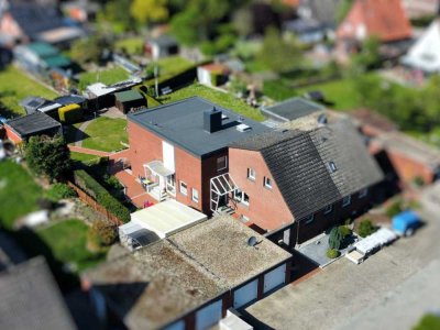 *Interessante Wohnlösung 
mit 2 Wohneinheiten*
Doppelhaushälfte mit ELW in 
Rheine-Dorenkamp