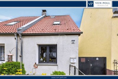 Historische Doppelhaushälfte mit großzügigem Garten und vielseitigen Nebengebäuden