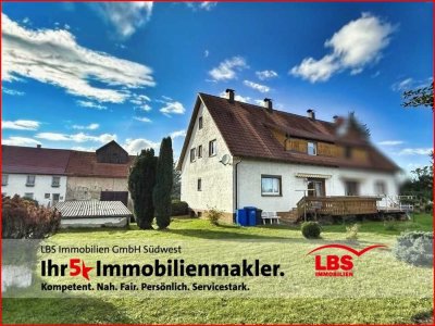 Doppelhaushälfte mit zwei Wohnungen, traumhaften Garten und Garage