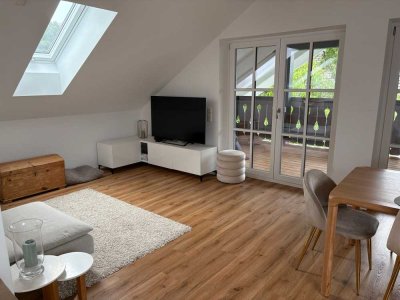 Traumhafte 3-Zimmer-Dachgeschoßwohnung in Widdersberg mit Loggia und Blick auf die Alpen
