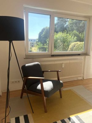 Möblierte 1-Zimmer-Wohnung mit großzügiger Terrasse & Gartenblick in Tübingens Bestlage