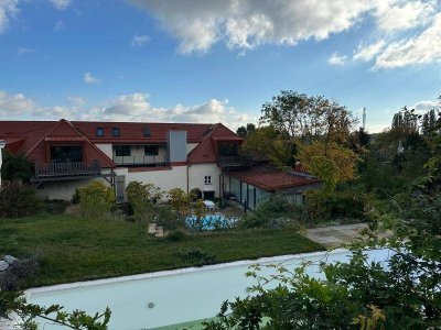 Luxuriös wohnen in den Weinbergen – Exklusive 3-Zimmer-Wohnung mit Gartenblick