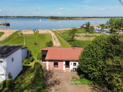 Seltene Gelegenheit: 1. Reihe Schlei - Grundstück mit Boots- und Badesteg und Altbestand