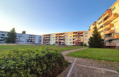 Charmante Erdgeschosswohnung mit Balkon, TG-Stellplatz und direktem Zugang ins Grüne