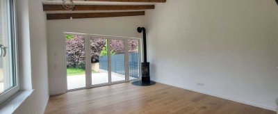 Neubau-Erstbezug: sehr schöne Wohnung, mit Wärmepumpe, PV-Anlage, Kamin, Sonnenterrasse, Garten