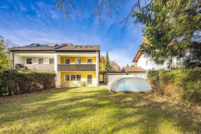 In Riemerlinger Bestlage: Haushälfte mit großem parkähnlichem Südgarten zur Modernisierung