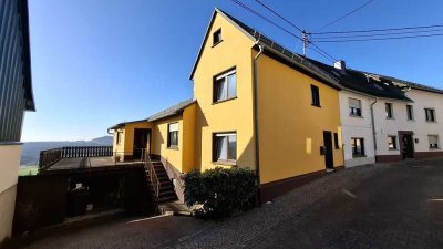 Ein-/Zweifamilienhaus mit unbezahlbarem Weitblick und weiterem Baugrundstück mitten in 56414 Salz