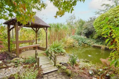 Bramsche-Hase: Charmantes Haus mit Wintergarten auf weitläufigem Grundstück!