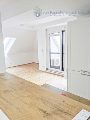 Exklusive 2-Zi.-DG-Whg. mit Aufzug, Klima, EBK, Balkon & Stellplatz