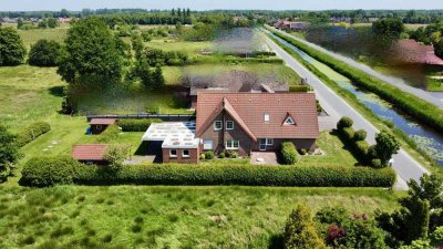 Großzügiges Einfamilienhaus auf traumhaftem Grundstück in Wiesmoor – direkt am Kanal!