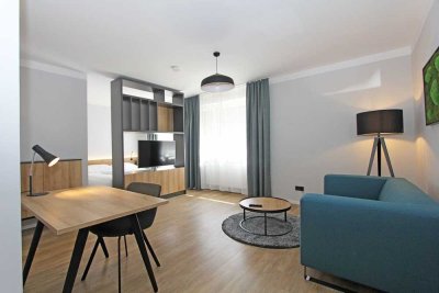 Ruhiges, modern möbliertes Design-Apartment in U3 und Isarnähe.