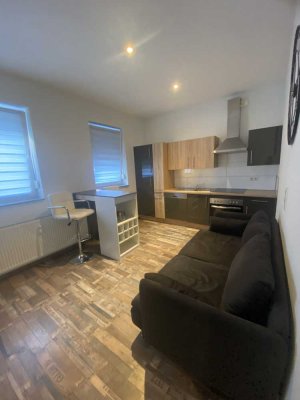 Exklusive 2-Zimmer-Erdgeschosswohnung mit geh. Innenausstattung mit Balkon und EBK in Mundelsheim