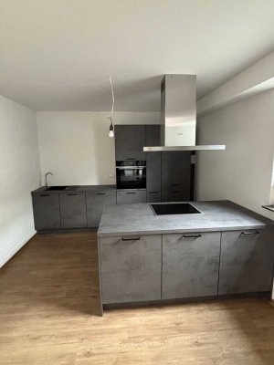 Erstbezug!Moderne Neubau-Souterrainwohnung mit Einbauküche,Terrasse & Stellplatz in Massenbachhausen