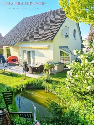 Vielseitiges Einfamilienhaus mit separater Gewerbeeinheit in ruhiger Lage