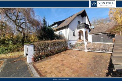 Viel Raum zum Leben: Familienfreundliches Zuhause mit sonnigem Garten und Einliegerwohnung