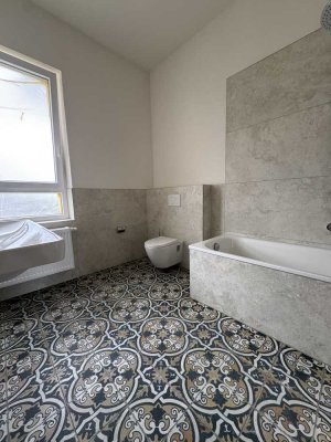 2ZKB mit externem 3. Zimmer in kernsanierter Villa, Erstbezug!  – Erdgeschoss