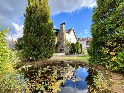 Einfamilienhaus mit Charakter und Bauplatz-Reserve in guter Lage