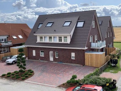 Exklusive Ferienwohnung: Erdgeschoss mit Terrasse in bester Lage von Nordseeheilbad Norddeich