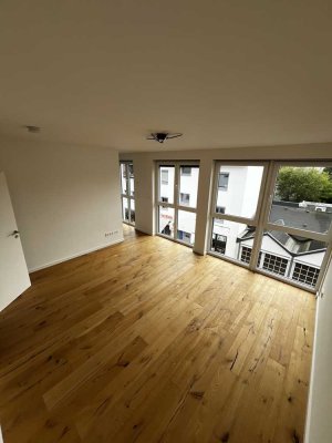 Neubau! Stilvolle 1-Zimmer-Wohnung mit EBK & Aufzug in Bonn-Duisdorf