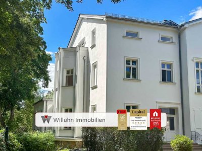 Charmante Denkmalwohnung mit Westbalkon l Aufzug | Tiefgaragenstellplatz optional