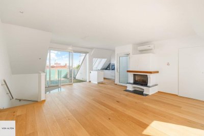 360°-Panoramablick: Energieeffiziente, barrierefreie DG-Maisonette mit privatem Lift, zwei Terrassen und Kamin