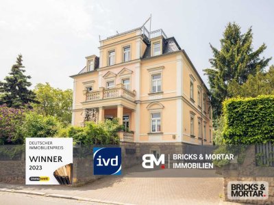 Stilvolle Erdgeschosswohnung in denkmalgeschützter Villa mit Kamin