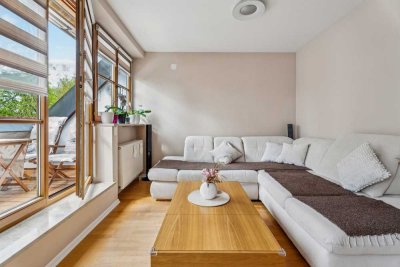 Stilvolle Maisonette-Dachgeschosswohnung mit Loggia und Flussblick