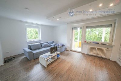 Gepflegte 3-Zi.-Whg. mit Balkon, EBK 
und Kellerabteil sowie Stellplatz in zentraler Wohnlage