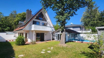 Ruhige Doppelhaushälfte mit uneinsehbarem Gartenparadies inkl. Pool in begehrter Lage von Gräfelfing