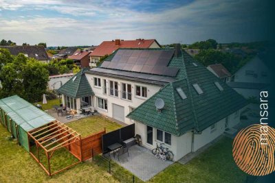 Elegantes Zuhause mit viel Platz und hochwertiger Ausstattung sowie nachhaltiger Energie