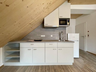 Kompakt &amp; modern – Dachgeschosswohnung ideal für Singles
