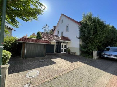 Willkommen in Ihrem neuen Zuhause – Familienidyll mit Wintergarten auf grünem Erbpachtgrundstück