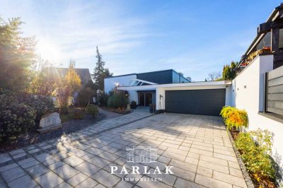 Stilvolles Wohnen im Architektenhaus mit privatem Poolparadies in Bestlage
