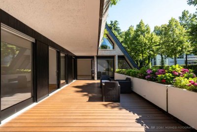 Begehrte Retro-Terrassenhaus-Architektur: Wohnrefugium in Köln-Marienburg